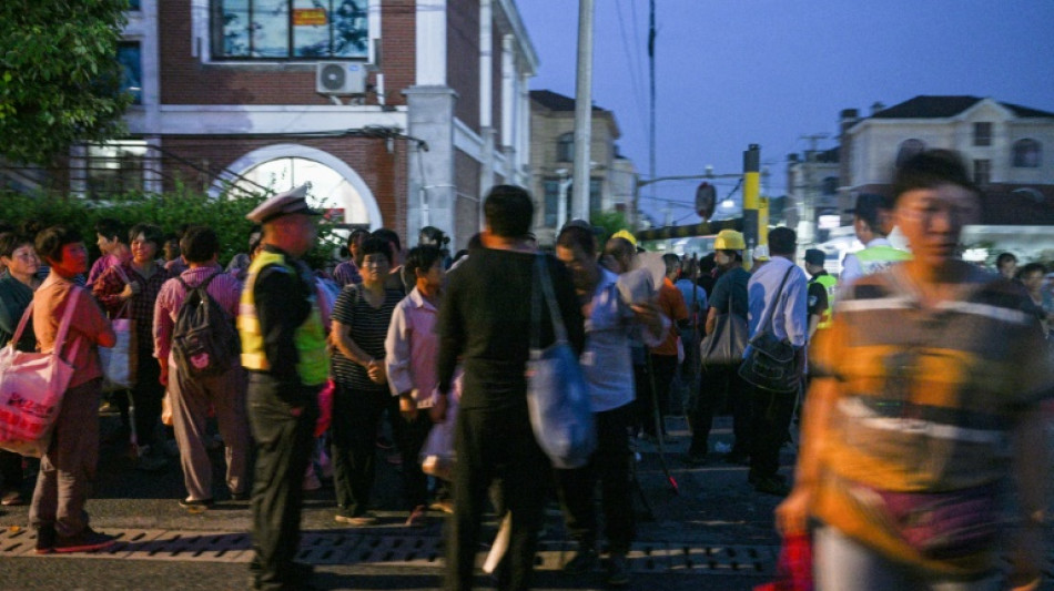 Day labourers seek dwindling jobs pre-dawn in Shanghai suburb