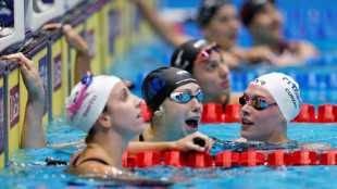 Gretchen Walsh sets 100m fly world record at US Olympic swimming trials