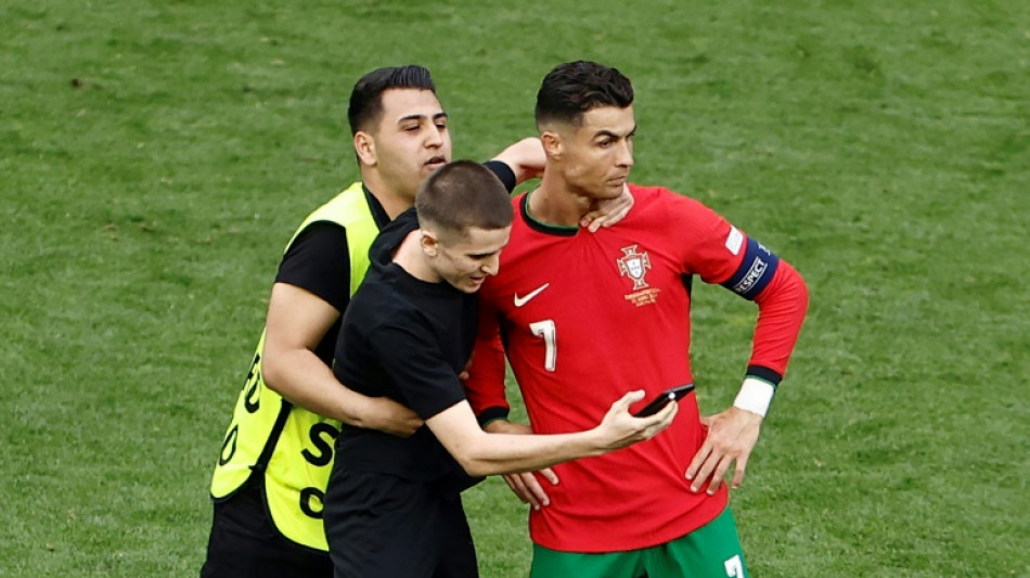 Euro 2024 security bulked after pitch invaders aim for Ronaldo selfies