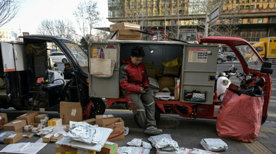 "Pas d'argent" à dépenser: dans les rues de Pékin, la crise économique inquiète