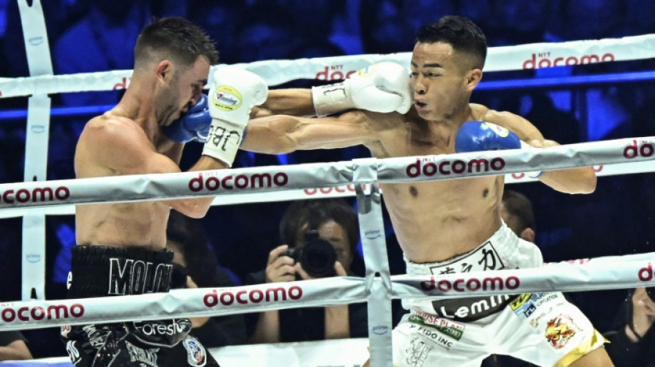 Takei beats Moloney in Tokyo to win bantamweight world title