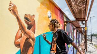 Graffiti brings Benin's walls alive with treasures from past