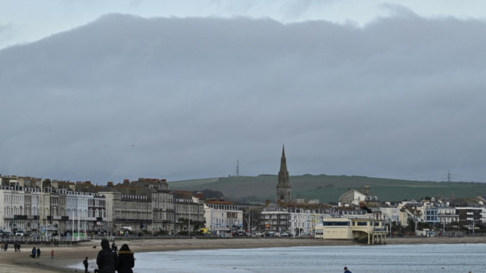 In UK seaside town, migrants call barge accommodation a 'prison'