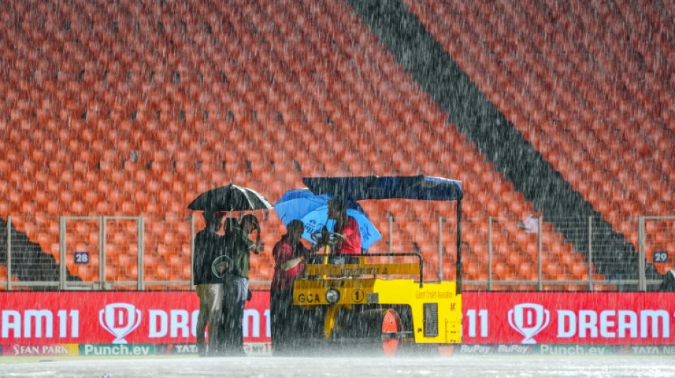 Gujarat out of IPL play-off race after washout