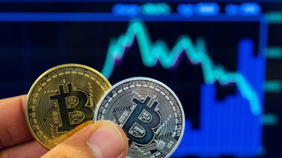 Stocks slip before inflation report, as bitcoin hits fresh record