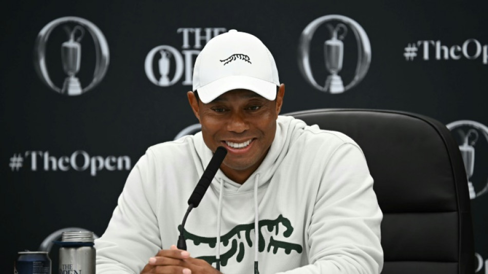 Tiger talks up Open chances, dismisses retirement