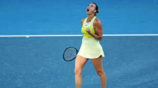 Aggressive Sabalenka storms on as rain mars Australian Open