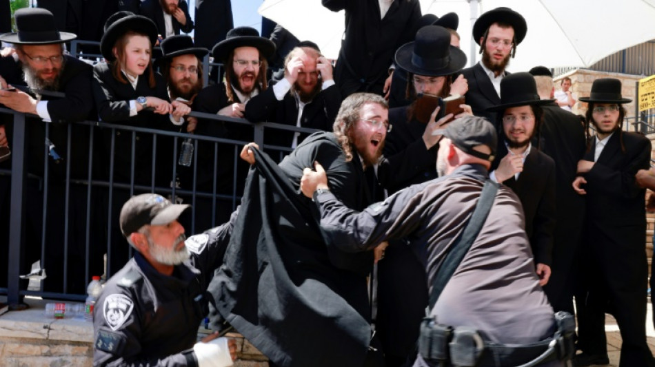 Jewish worshippers clash with police at pilgrimage site