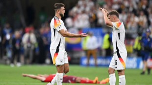 Last-gasp Fuellkrug goal rescues top spot for Euro hosts Germany