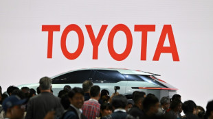 Toyota hikes annual forecast as first-half net profit doubles