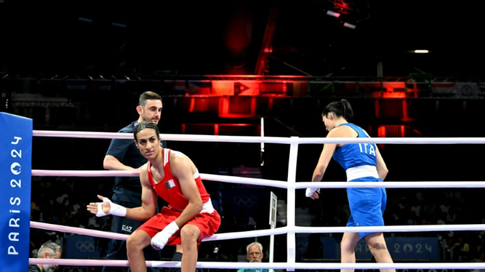 Algeria boxer in Olympic gender row wins in 46 seconds as Italian PM hits out