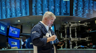 Markets waver ahead of earnings, Powell speech