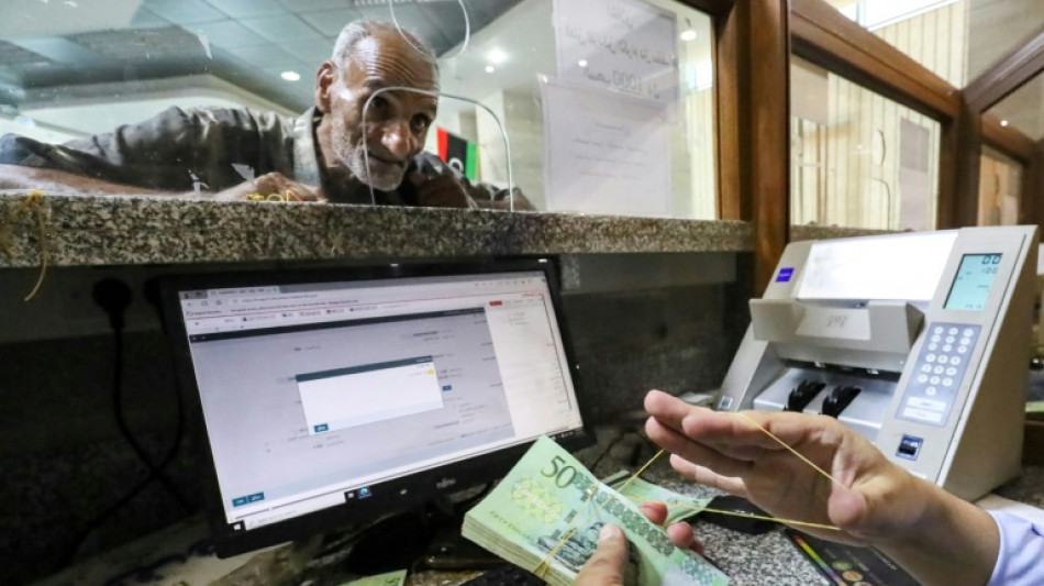 Cash crunch pushes Libyans to bank cards despite hurdles