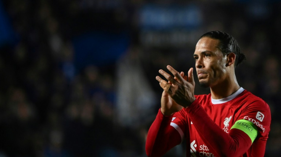 Van Dijk plans to stay on to aid Liverpool's 'big transition'