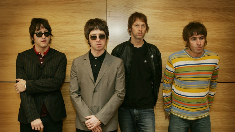 Guitar that broke up Oasis sells for $390,000