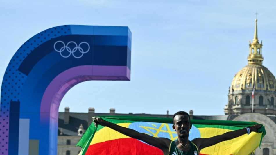 Ethiopia's Tola wins Olympic marathon as France aim to dethrone NBA all-stars