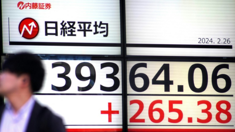 Asian markets mostly lower on profit-taking after tech surge