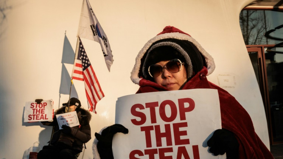 Thousands of South Koreans protest as president digs heels in