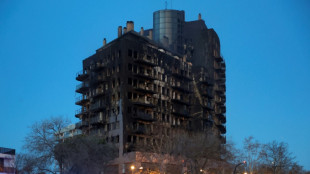 Cuatro muertos y 14 desaparecidos en un incendio que devoró un edificio en España