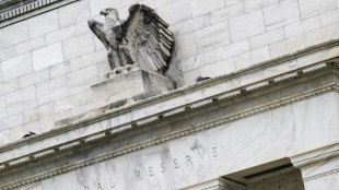 Stocks mostly up as markets digest Fed rate signals