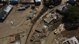 Venezuelan town buries its dead after landslide