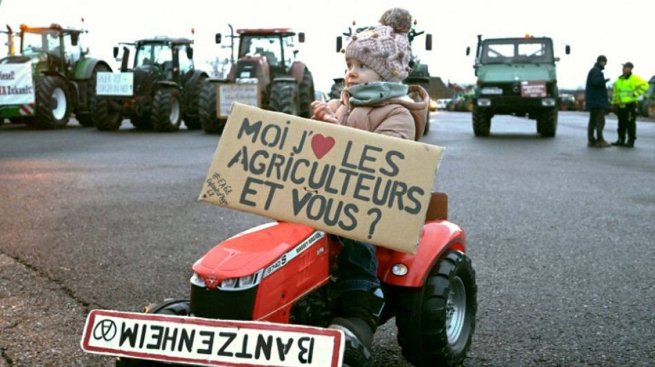 French farmers lift roadblocks as Europe protests persist