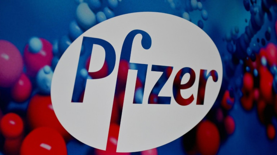 Pfizer reports loss as Covid-19 revenues shrink