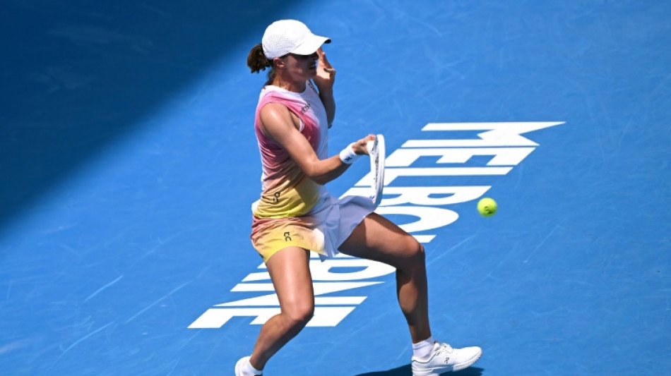 Swiatek battles past Siniakova into Australian Open second round