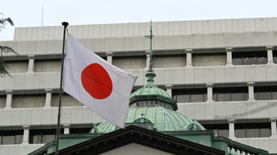 Yen falls as Japan hikes rates but stocks mixed ahead of Fed