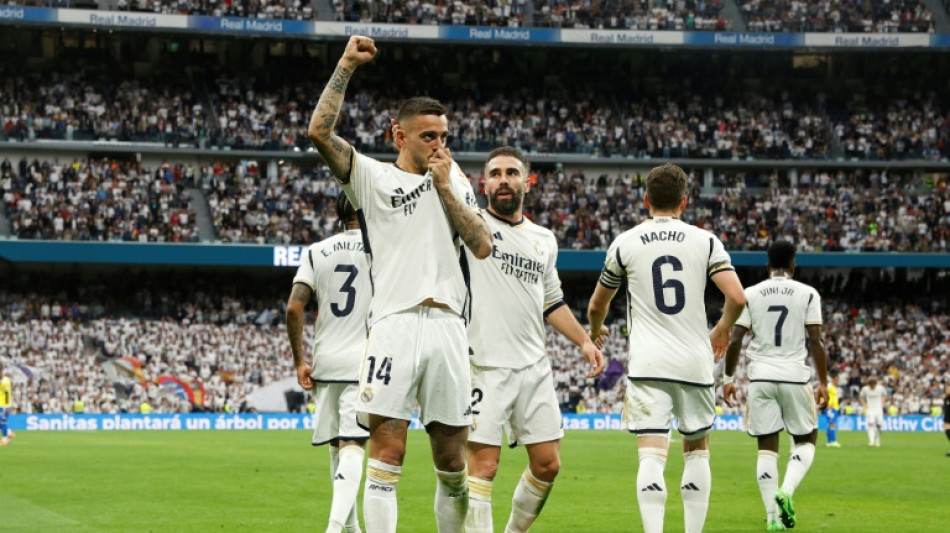 Real Madrid claim 36th Spanish title after Girona stun Barca