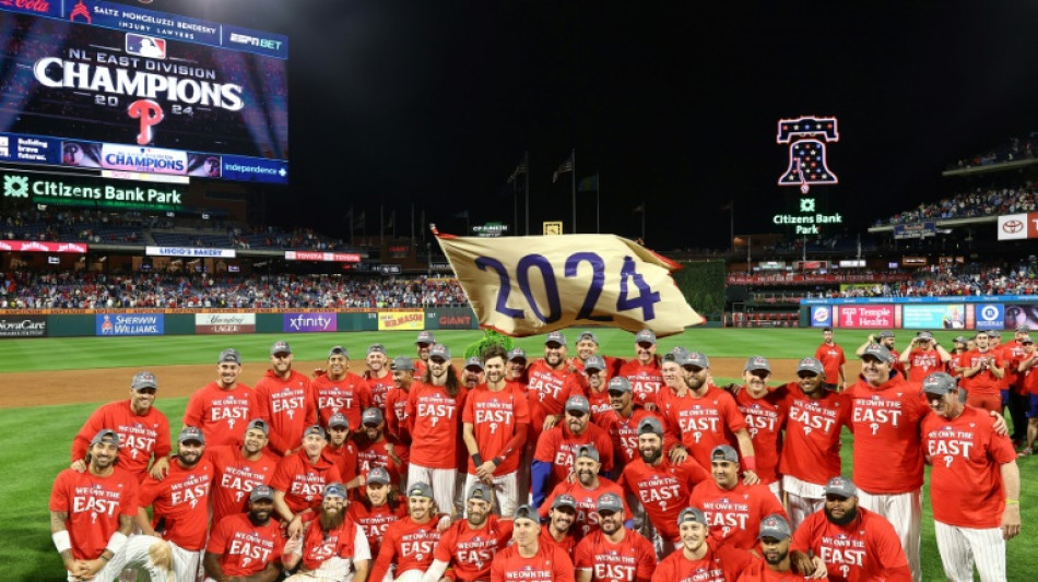 Phillies clinch division title, eye top seed