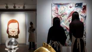 Defying downturn, auction houses bid high on Hong Kong