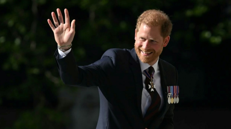 Prince Harry says battle against tabloids worsened rift with family