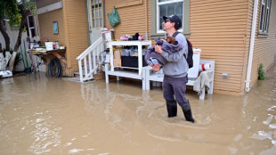 California scrambles to fix levee as another storm looms