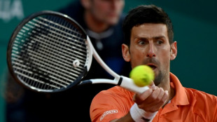 Djokovic survives scare to beat Djere in Belgrade