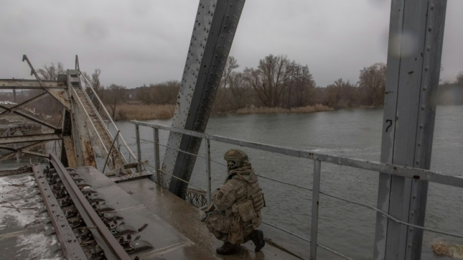 Ambushes and nostalgia on banks of frontline Ukraine river