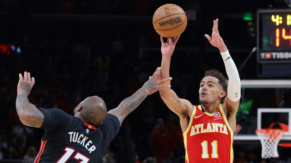 Hawks hold off Heat, Bucks thrash Bulls in NBA playoffs