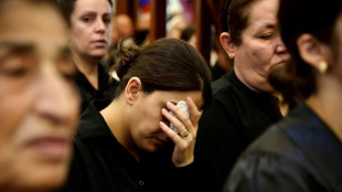 Grief, anger at Iraq mass for victims of wedding fire