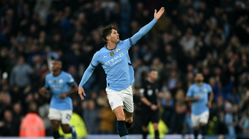 Stones salvages point for Man City against 10-man Arsenal