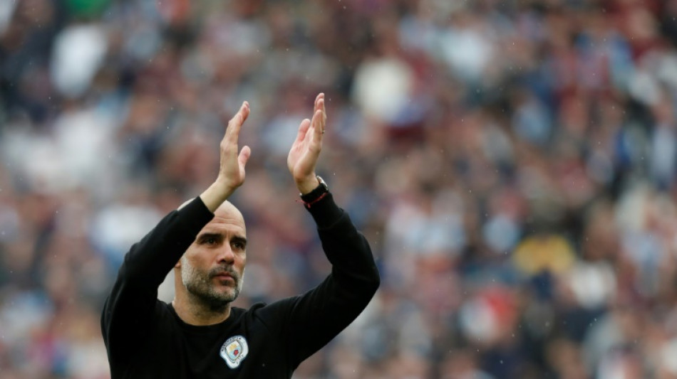 Guardiola urges Man City to seize title after dramatic West Ham draw