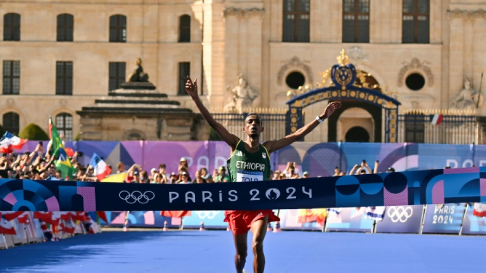 Ethiopia's Tola wins Olympic men's marathon, Kipchoge drops out