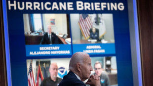 Hurricane whips up bitter US election battle