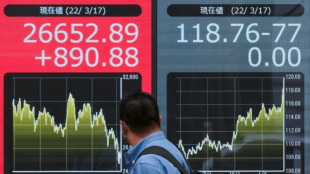 Stocks slide, oil climbs at end of volatile week