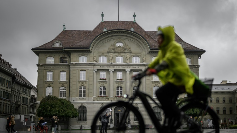 Swiss central bank cuts rate again amid strong franc worries