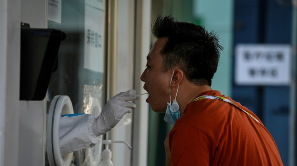 Chinese city of 21 million shuts down over Covid outbreak