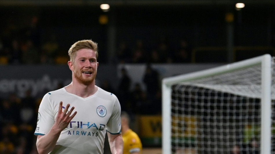 Four-goal De Bruyne edges Man City closer to Premier League title