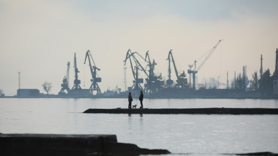 Ukraine puts off evacuation of key port besieged by Russian forces