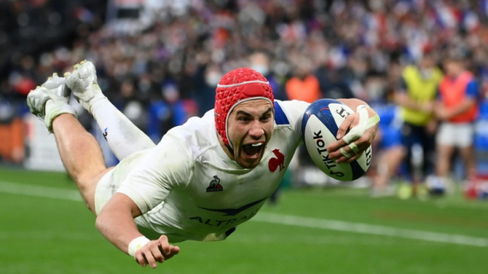 'Warrior' Villiere hat-trick sends France top of Six Nations