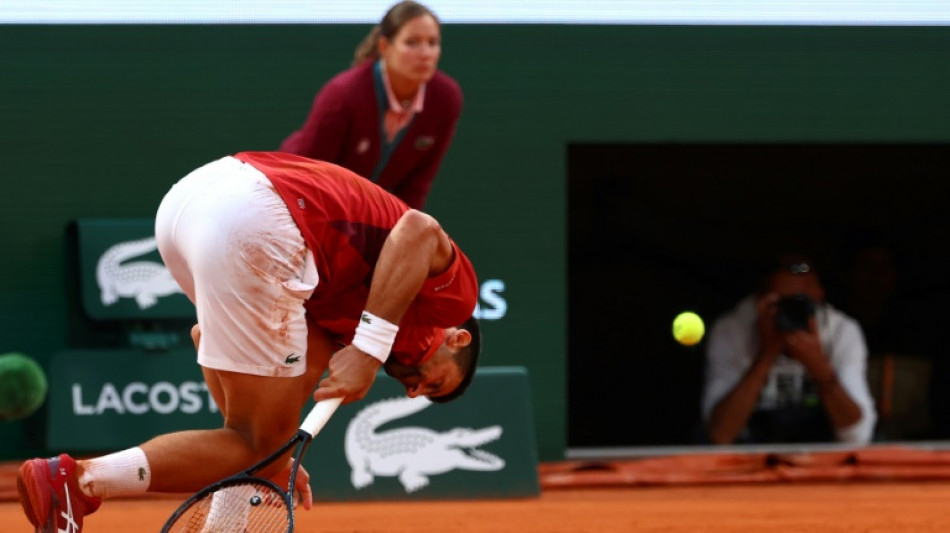 Djokovic withdrawal shakes up French Open as Swiatek roars into semis