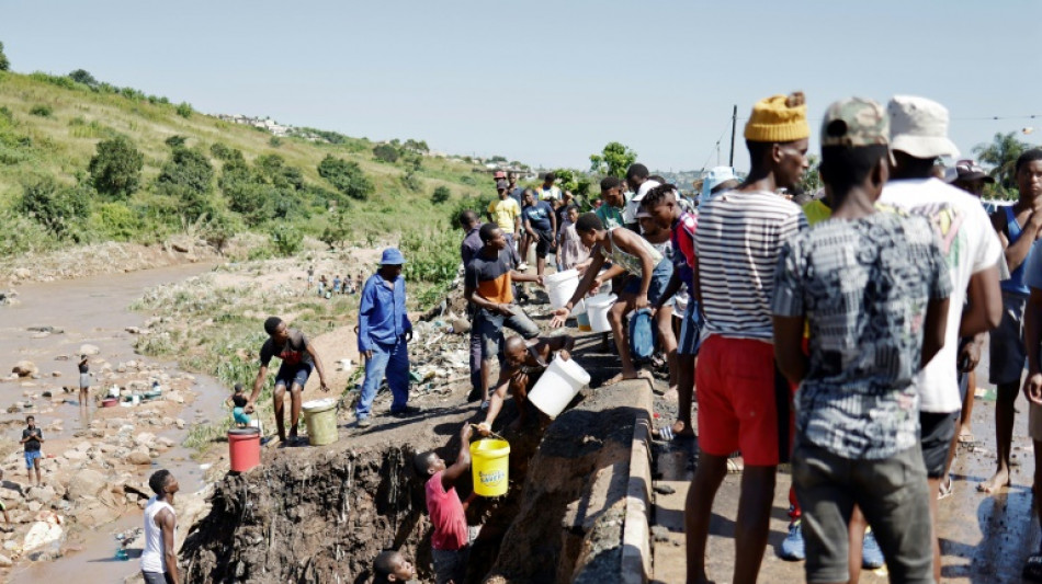 Without official aid, Durban flood victims dig themselves out